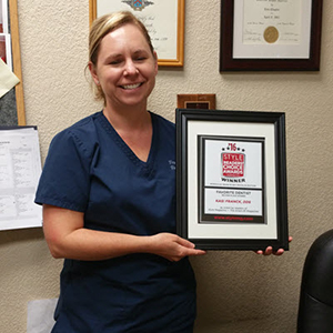 Dr. Kasi Franck receiving her award for being voted Best Dentist in Rocklin 2016 by readers of the Placer Herald